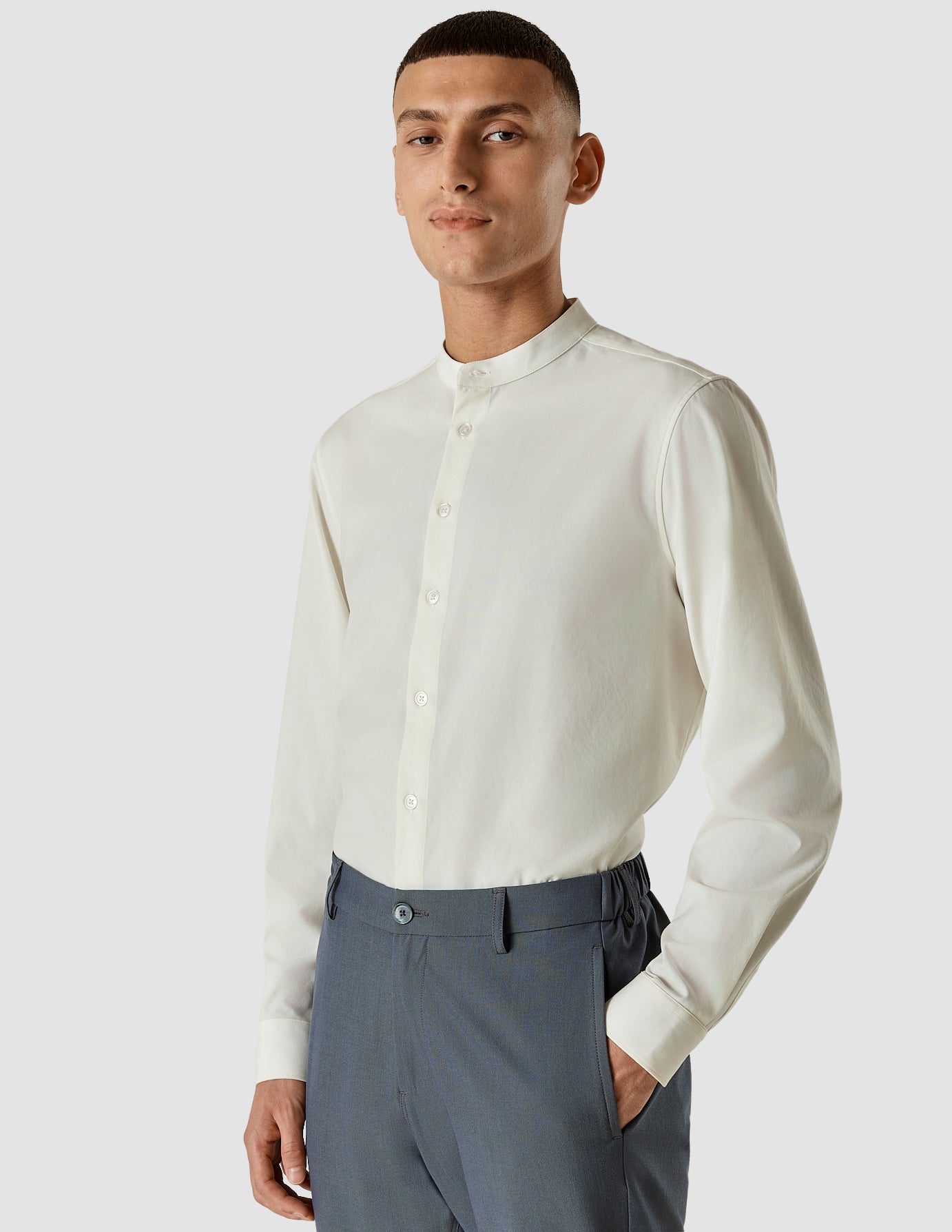 Model from the front wearing a Tech Linen Mandarin Long Sleeve Shirt White